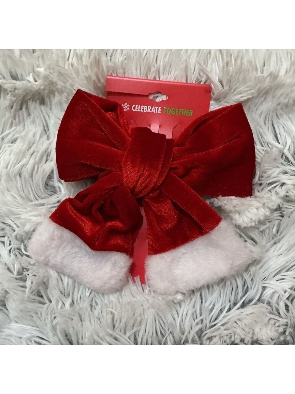 Celebrate Together oversized red velvet bow hair clip with white trim